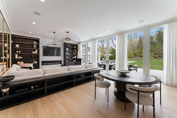 Dining room, Fireplace, Interior, Living room, Pendant Lights, Recessed Lighting, Wood Texture Flooring