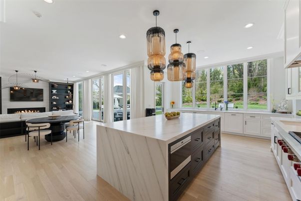 Chandelier, Dining room, Fireplace, Interior, Kitchen, Living room, Pendant Lights, Recessed Lighting, Wood Texture Flooring