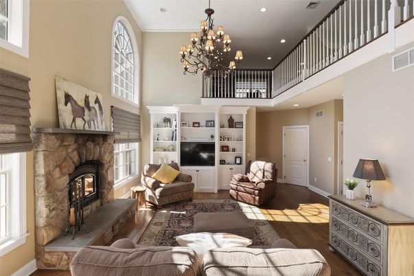 Chandelier, Fireplace, Interior, Living room, Recessed Lighting, Wood Texture Flooring
