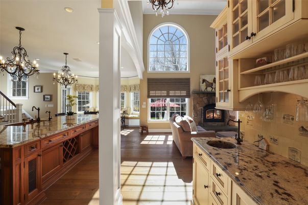 Chandelier, Fireplace, Interior, Living room, Recessed Lighting, Wood Texture Flooring
