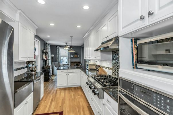 Interior, Kitchen, Pendant Lights, Recessed Lighting, Stainless Steel Appliances, Wood Texture Flooring