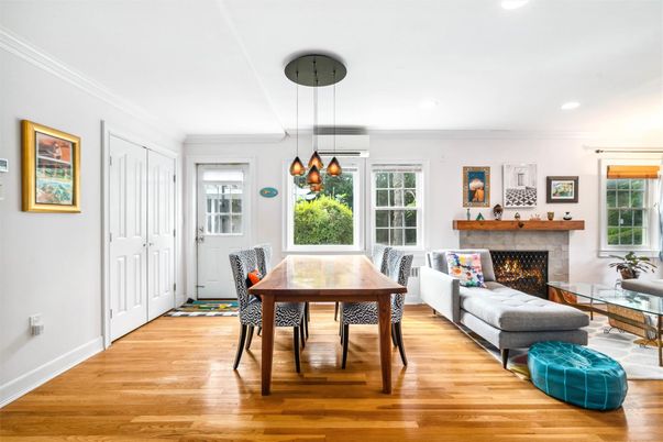 Dining room, Fireplace, Interior, Living room, Pendant Lights, Recessed Lighting, Wood Texture Flooring