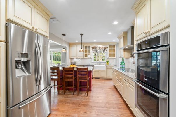 Dining room, Interior, Kitchen, Pendant Lights, Recessed Lighting, Stainless Steel Appliances, Wood Texture Flooring