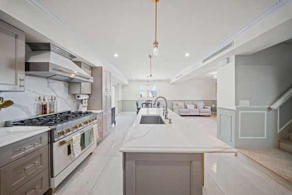 Interior, Kitchen, Marble Walls, Pendant Lights, Recessed Lighting, Stainless Steel Appliances