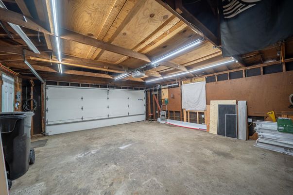 Garage, Interior, Stone Walls, Wooden Beams