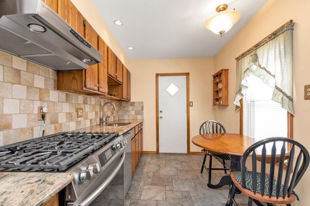 Interior, Kitchen, Recessed Lighting, Stainless Steel Appliances, Stone Walls