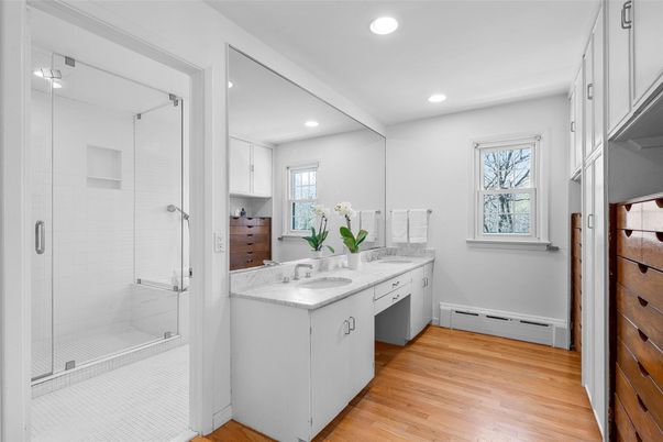 Bathroom, Dual Sink Vanities, Glass Shower, Interior, Recessed Lighting, Wood Texture Flooring