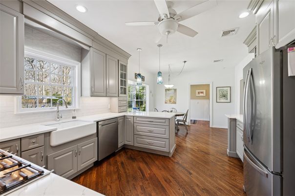 Dining room, Interior, Kitchen, Pendant Lights, Recessed Lighting, Stainless Steel Appliances, Wood Texture Flooring