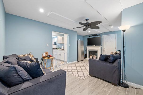 Fireplace, Interior, Living room, Recessed Lighting, Wood Texture Flooring