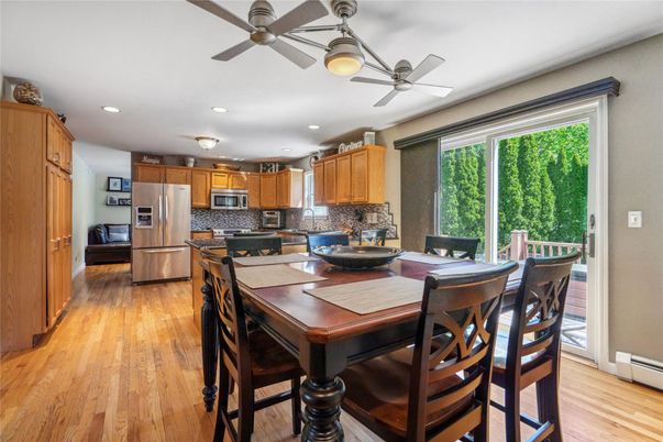 Dining room, Interior, Kitchen, Recessed Lighting, Stainless Steel Appliances, Wood Texture Flooring