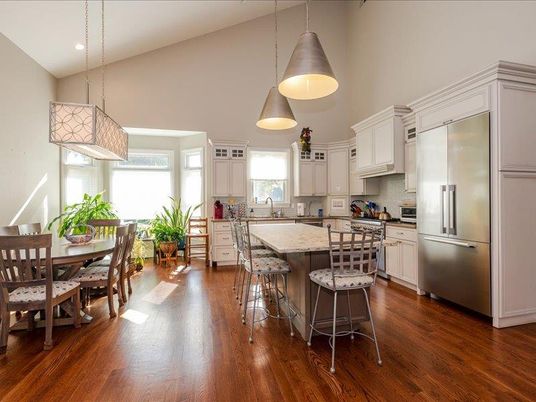 Dining room, Interior, Kitchen, Pendant Lights, Recessed Lighting, Stainless Steel Appliances, Wood Texture Flooring