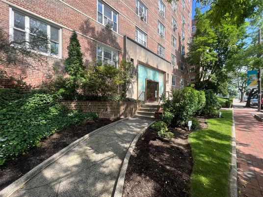 Exterior, Facade, Brick Facade, Condo Building