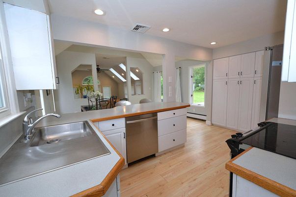 Dining room, Interior, Kitchen, Recessed Lighting, Stainless Steel Appliances, Wood Texture Flooring