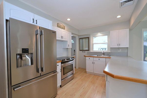 Interior, Kitchen, Recessed Lighting, Stainless Steel Appliances, Wood Texture Flooring