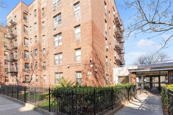Exterior, Facade, Brick Facade, Condo Building