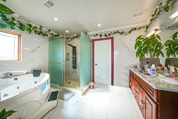 Bathroom, Dual Sink Vanities, Glass Shower, Interior, Marble, Marble Walls, Recessed Lighting