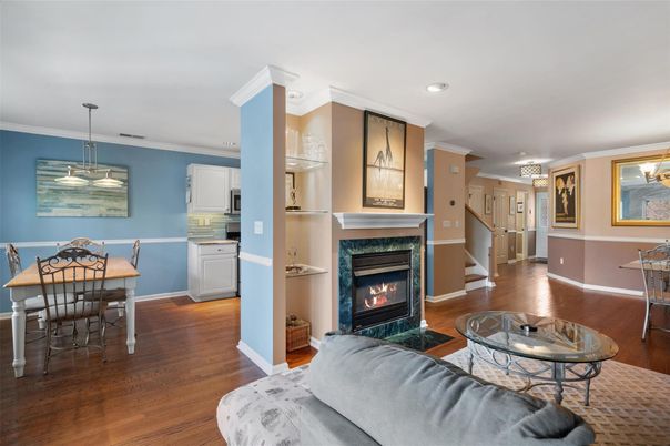 Dining room, Fireplace, Interior, Living room, Pendant Lights, Recessed Lighting, Wood Texture Flooring