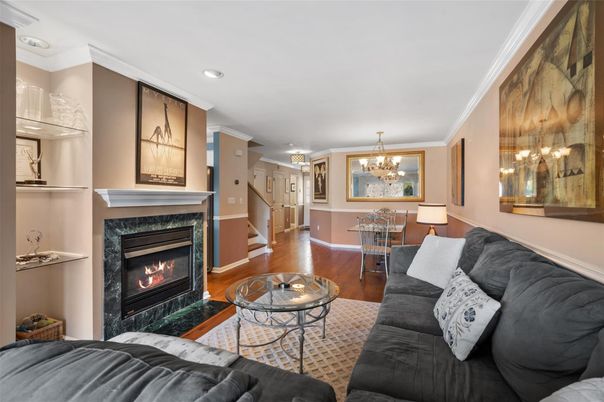 Chandelier, Dining room, Fireplace, Interior, Living room, Recessed Lighting, Wood Texture Flooring