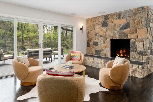 Fireplace, Interior, Living room, Recessed Lighting, Stone Walls, Wood Texture Flooring