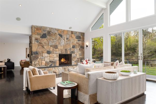 Fireplace, Interior, Living room, Recessed Lighting, Stone Walls, Wood Texture Flooring