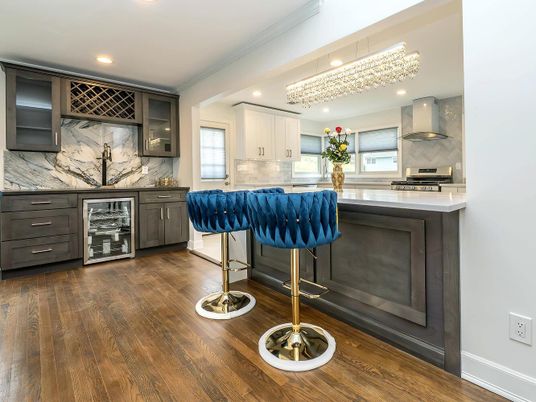 Chandelier, Interior, Kitchen, Marble Walls, Recessed Lighting, Stainless Steel Appliances, Wood Texture Flooring