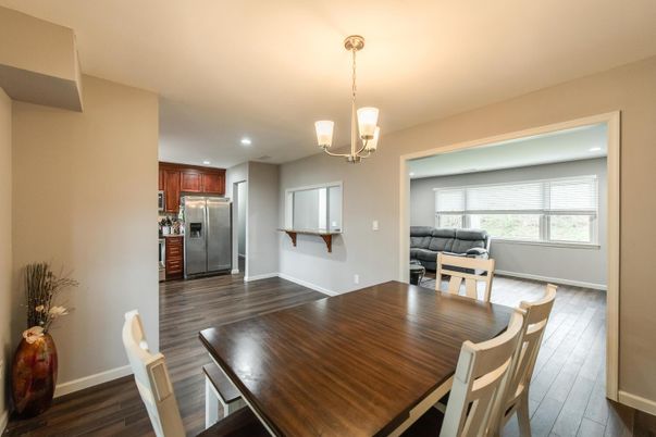 Dining room, Interior, Kitchen, Pendant Lights, Recessed Lighting, Stainless Steel Appliances, Wood Texture Flooring
