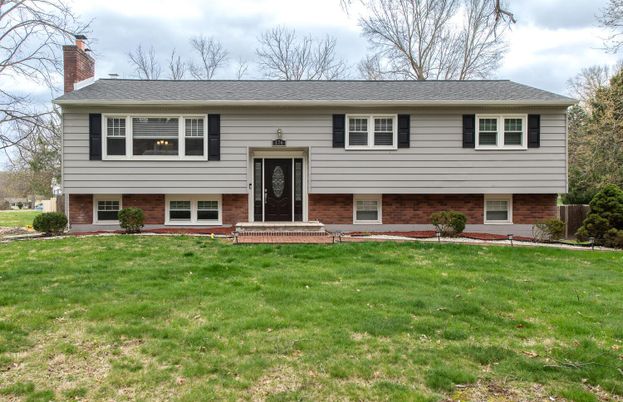 Exterior, Facade, Brick Facade, Raised Ranch