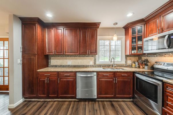 Interior, Kitchen, Pendant Lights, Recessed Lighting, Stainless Steel Appliances, Wood Texture Flooring