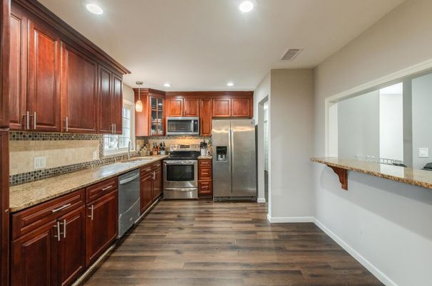 Interior, Kitchen, Recessed Lighting, Stainless Steel Appliances, Wood Texture Flooring