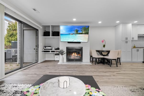 Dining room, Fireplace, Interior, Kitchen, Recessed Lighting, Wood Texture Flooring