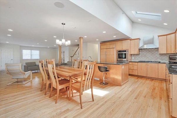Chandelier, Dining room, Interior, Kitchen, Pendant Lights, Recessed Lighting, Stainless Steel Appliances, Wood Texture Flooring