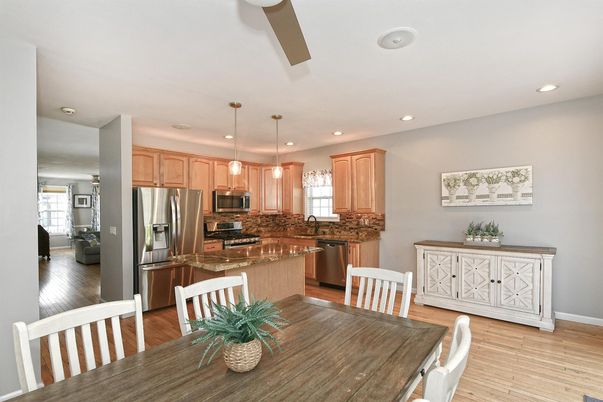 Dining room, Interior, Kitchen, Pendant Lights, Recessed Lighting, Stainless Steel Appliances, Wood Texture Flooring