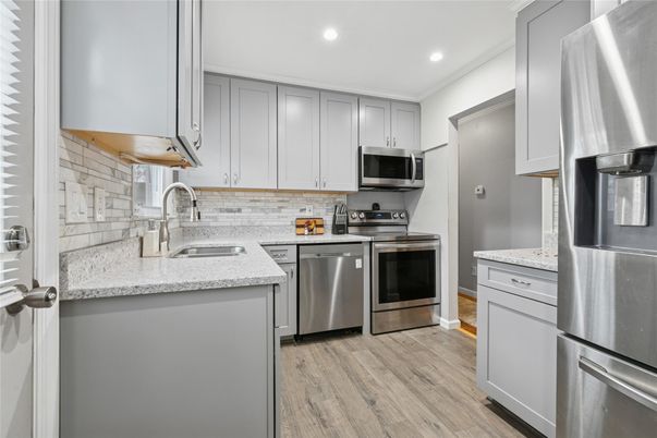 Interior, Kitchen, Recessed Lighting, Stainless Steel Appliances, Wood Texture Flooring