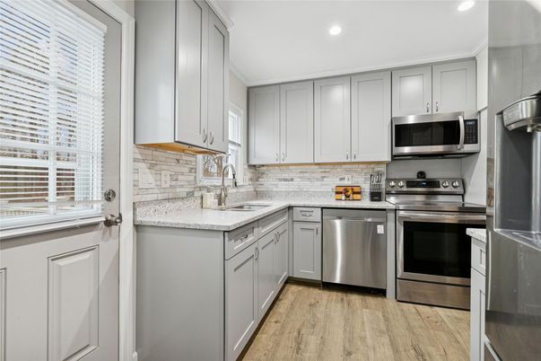 Interior, Kitchen, Recessed Lighting, Stainless Steel Appliances, Wood Texture Flooring