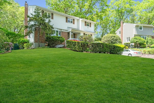 Attached, Backyard, Exterior, Facade, Brick Facade, Raised Ranch