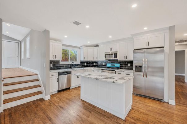 Interior, Kitchen, Recessed Lighting, Stainless Steel Appliances, Wood Texture Flooring