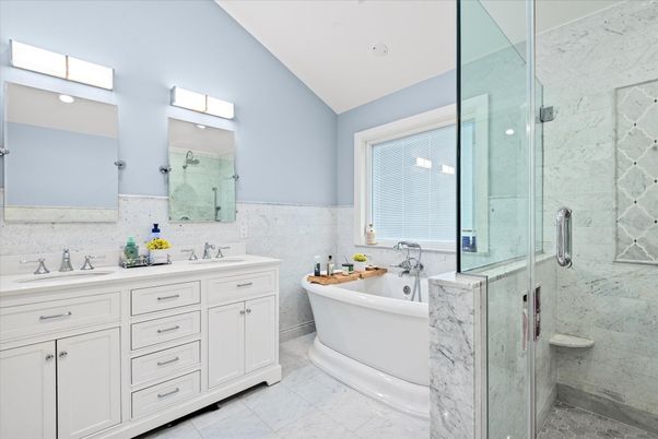 Bathroom, Dual Sink Vanities, Free Standing Baths, Glass Shower, Interior, Marble Walls, Recessed Lighting