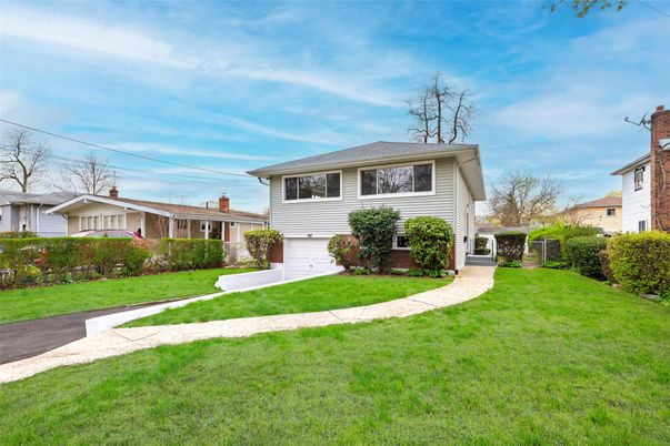 Attached, Backyard, Exterior, Facade, Brick Facade, Split Level