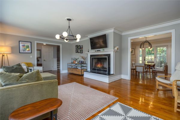 Chandelier, Dining room, Fireplace, Interior, Living room, Pendant Lights, Wood Texture Flooring