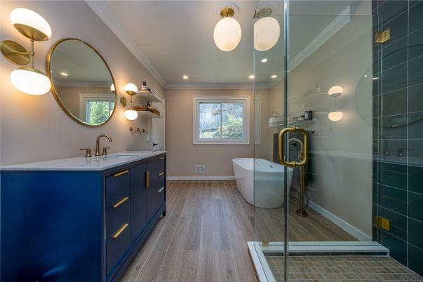 Bathroom, Dual Sink Vanities, Free Standing Baths, Glass Shower, Interior, Recessed Lighting, Wood Texture Flooring
