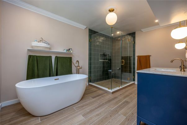Bathroom, Free Standing Baths, Glass Shower, Interior, Recessed Lighting, Wood Texture Flooring