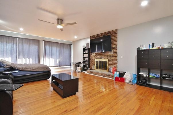 Fireplace, Interior, Recessed Lighting, Stone Walls, Wood Texture Flooring