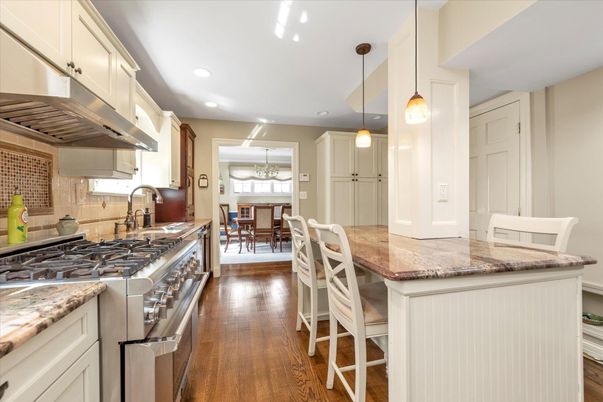 Dining room, Interior, Kitchen, Pendant Lights, Recessed Lighting, Stainless Steel Appliances, Wood Texture Flooring