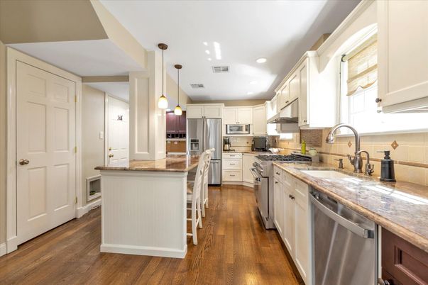 Interior, Kitchen, Pendant Lights, Recessed Lighting, Stainless Steel Appliances, Wood Texture Flooring