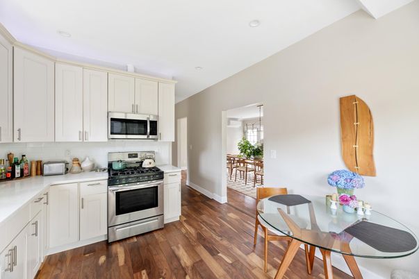 Dining room, Interior, Kitchen, Pendant Lights, Recessed Lighting, Stainless Steel Appliances, Wood Texture Flooring