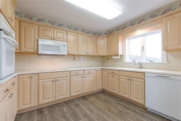 Interior, Kitchen, Tile Countertops, Wood Texture Flooring