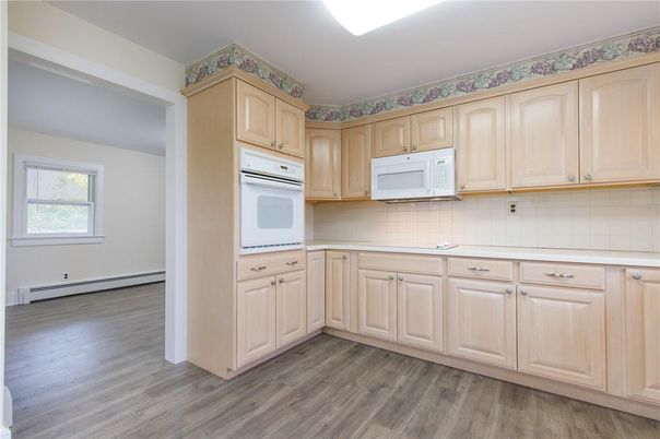 Interior, Kitchen, Tile Countertops, Wood Texture Flooring