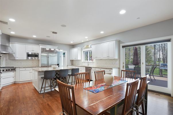 Dining room, Interior, Kitchen, Pendant Lights, Recessed Lighting, Stainless Steel Appliances, Wood Texture Flooring