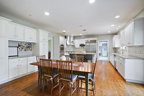 Dining room, Interior, Kitchen, Recessed Lighting, Stainless Steel Appliances, Wood Texture Flooring