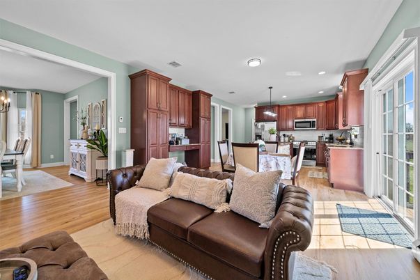 Dining room, Interior, Kitchen, Living room, Pendant Lights, Recessed Lighting, Stainless Steel Appliances, Wood Texture Flooring